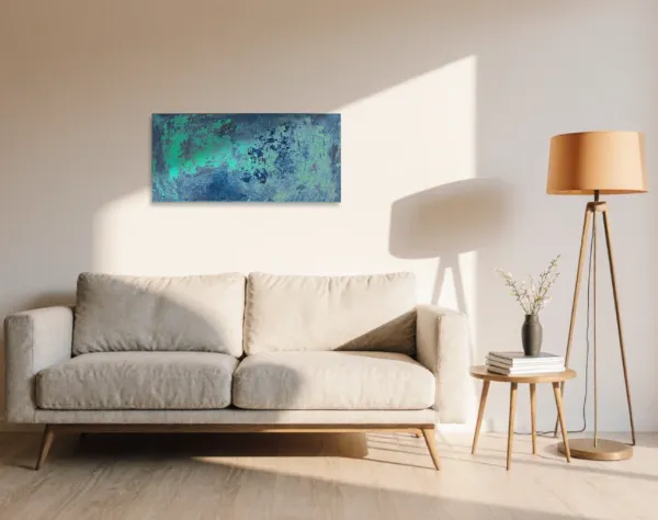 Leinwand mit aktivierter Acryloxydmischung von links und verschieden farbigen Acrylfarben. In die Fläche ist die Zahl Zwei durch ein Raster gespachtelt. Das Bild hängt in einem Raum über einem Sofa. | mixed-art - wolfram schäfers
