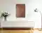 Ein Bild mit der Anmutung einer uralten, verrosteten Metallplatte mit einem Kölner Stadtwappen, hängt über einem Sideboard in einem Flur. Von dem zeitgenössischen Künstler Wolfram Schäfers. – mixed-art Ein Bild mit der Anmutung einer uralten, verrosteten Metallplatte mit einem Kölner Stadtwappen, hängt über einem Sideboard in einem Flur. Von dem zeitgenössischen Künstler Wolfram Schäfers. – mixed-art