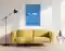 Ein Bild mit einer blauen, überstreckte Folie mit Zuglöchern auf Leinwand, hängt in einem Raum über einem Sofa. | wolfram schäfers Ein Bild mit einer blauen, überstreckte Folie mit Zuglöchern auf Leinwand, hängt in einem Raum über einem Sofa. | wolfram schäfers